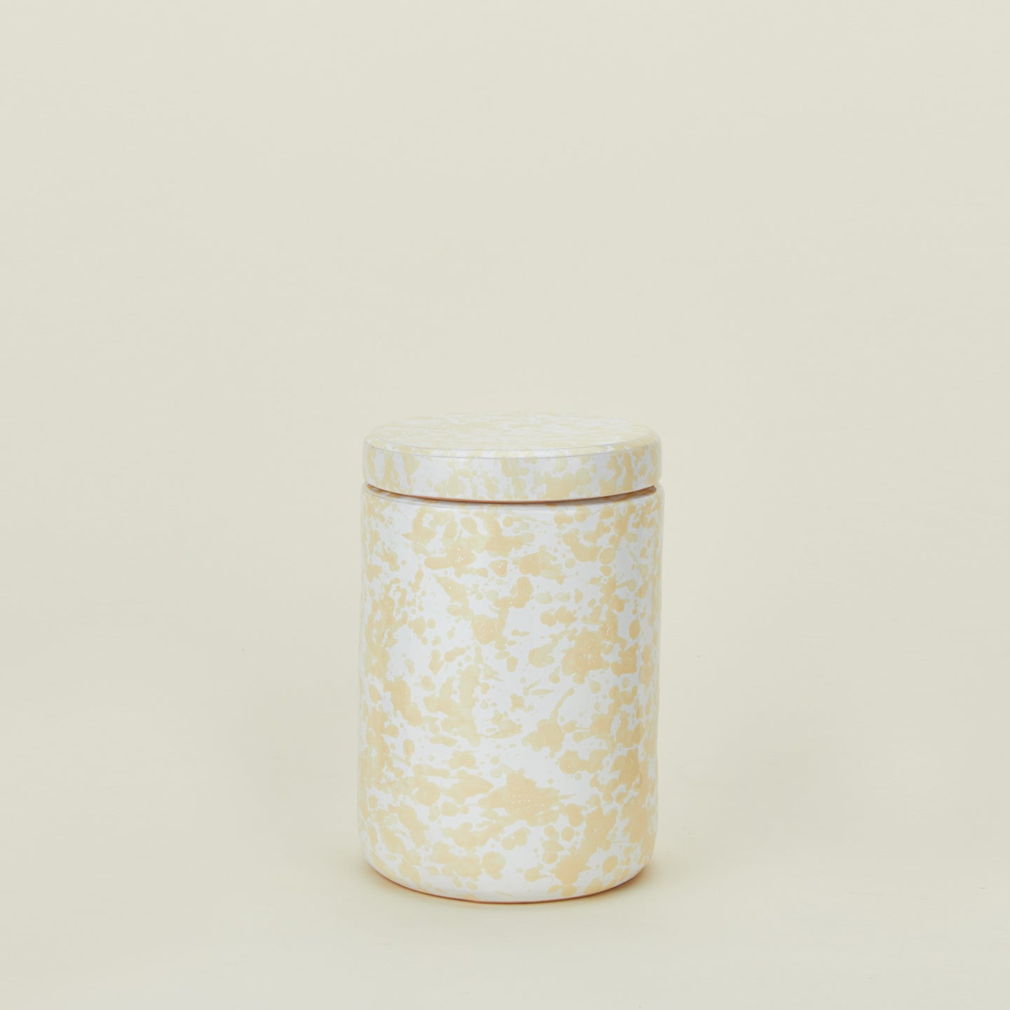 Large splatterware canister in white and ivory