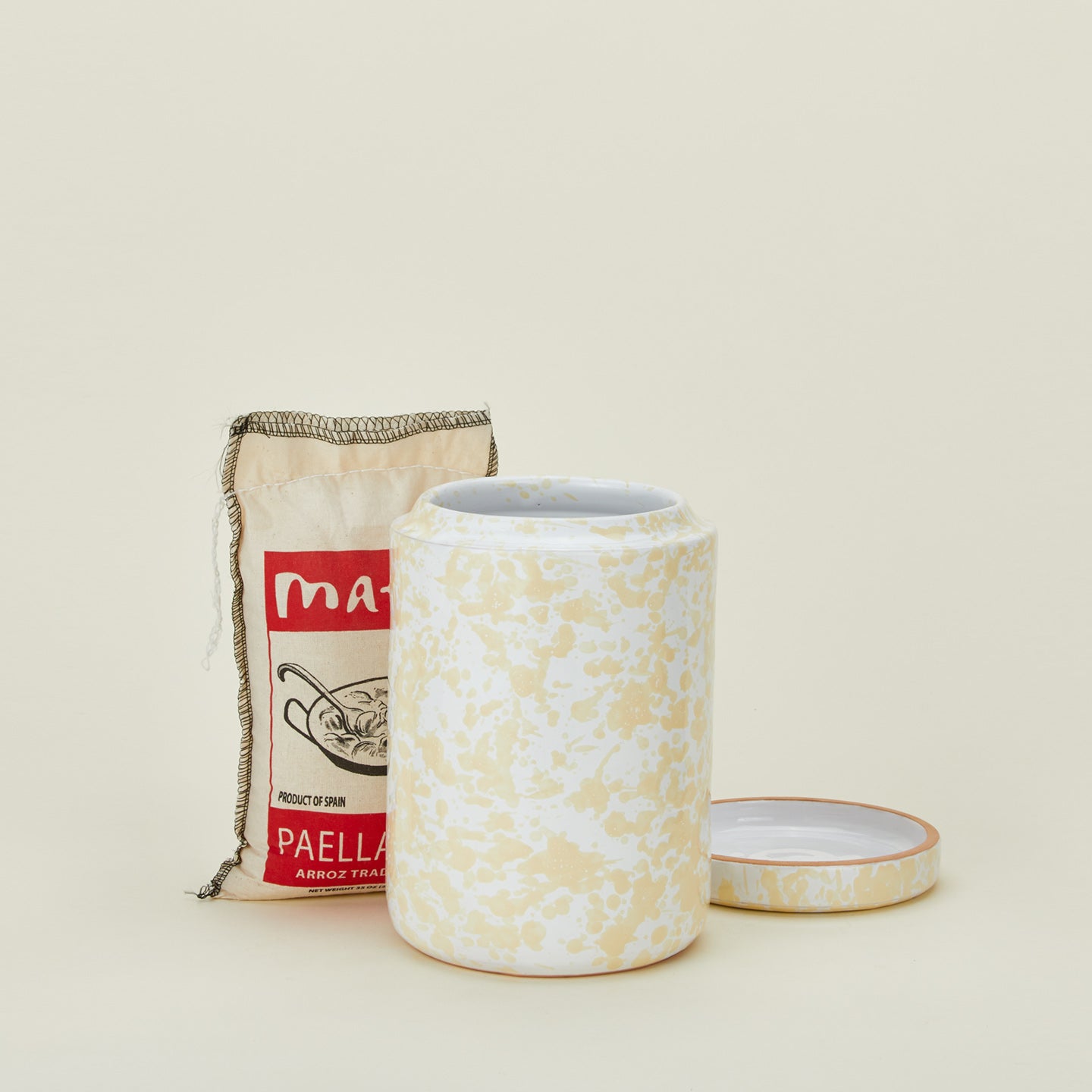 Large splatterware canister in white and ivory with paella mix