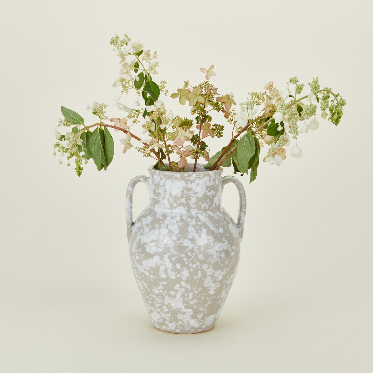 Large splatterware vase in grey and white with florals