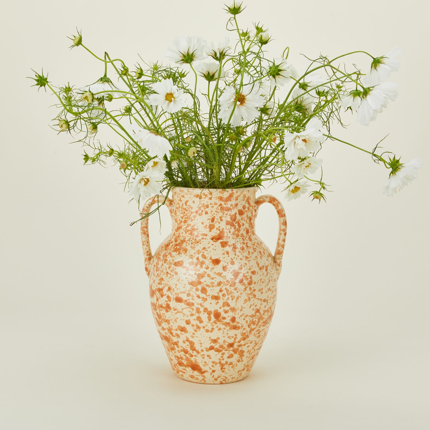 Large splatterware vase in ivory and bronze  with florals