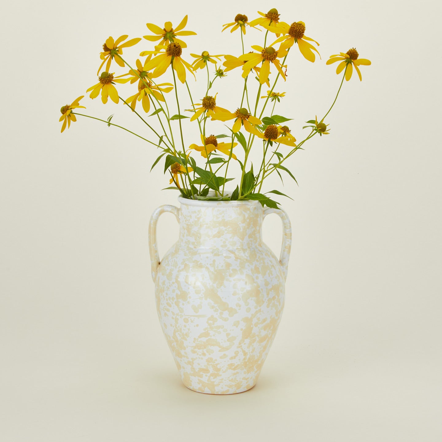 Large splatterware vase in white and ivory with florals