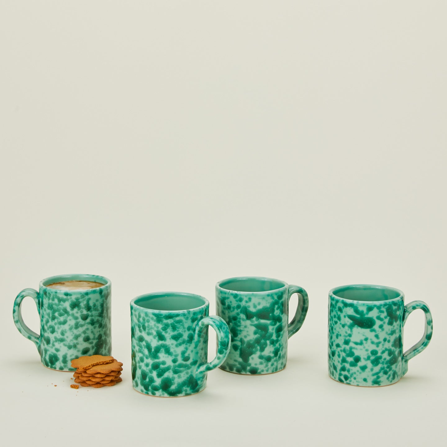 Splatterware mugs set of 4 in sage and green with biscuits