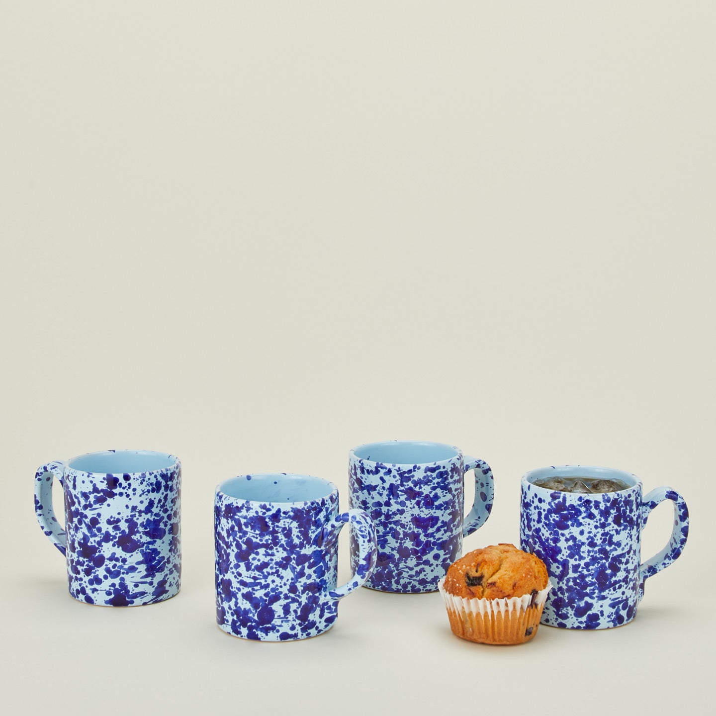 Splatterware mug set of 4 in sky and cobalt with muffin