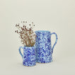 Large and small splatterware pitcher in sky and cobalt with florals