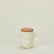 Splatterware salt cellar in ivory and white with cork top