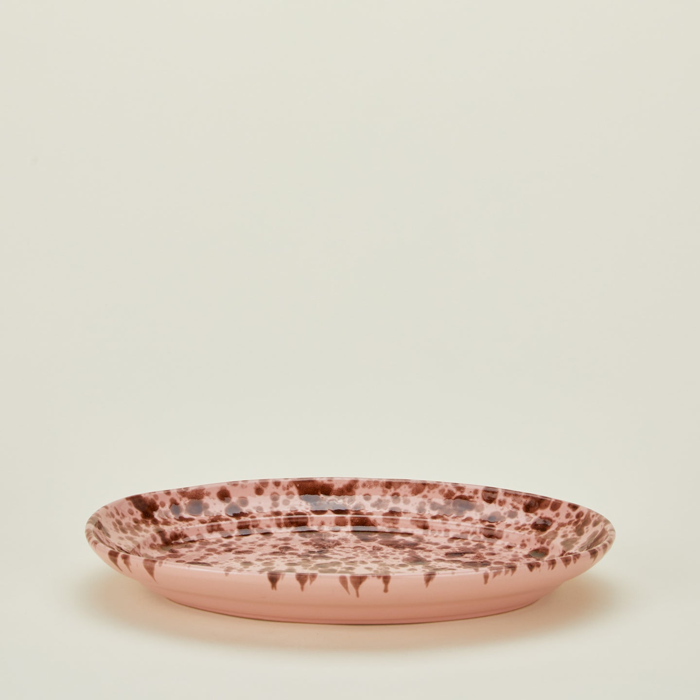 Splatterware serving platter in blush and terracotta