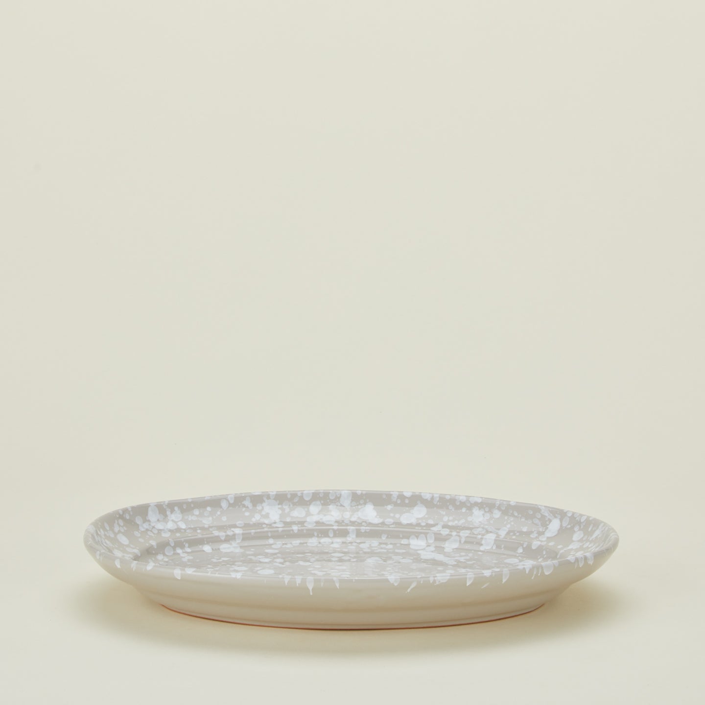Splatterware serving platter in grey and white