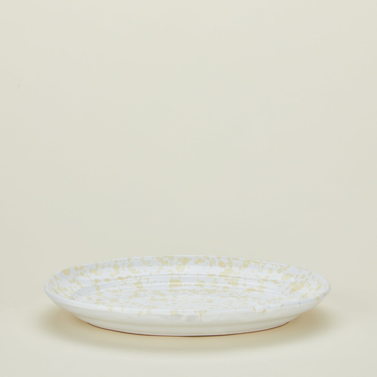 Splatterware serving platter in white and ivory
