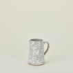 Small splatterware pitcher in grey and white