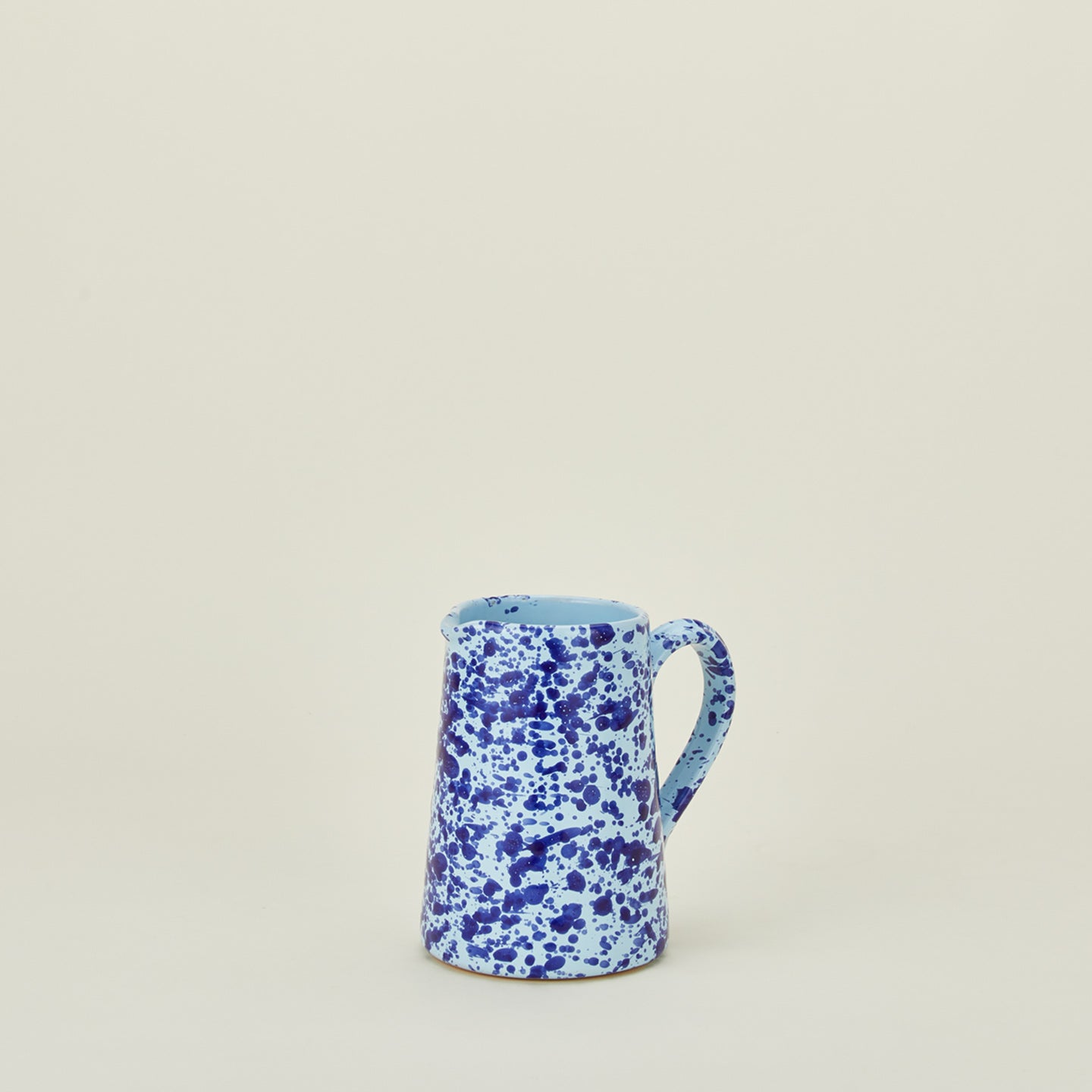 Small splatterware pitcher in sky and cobalt