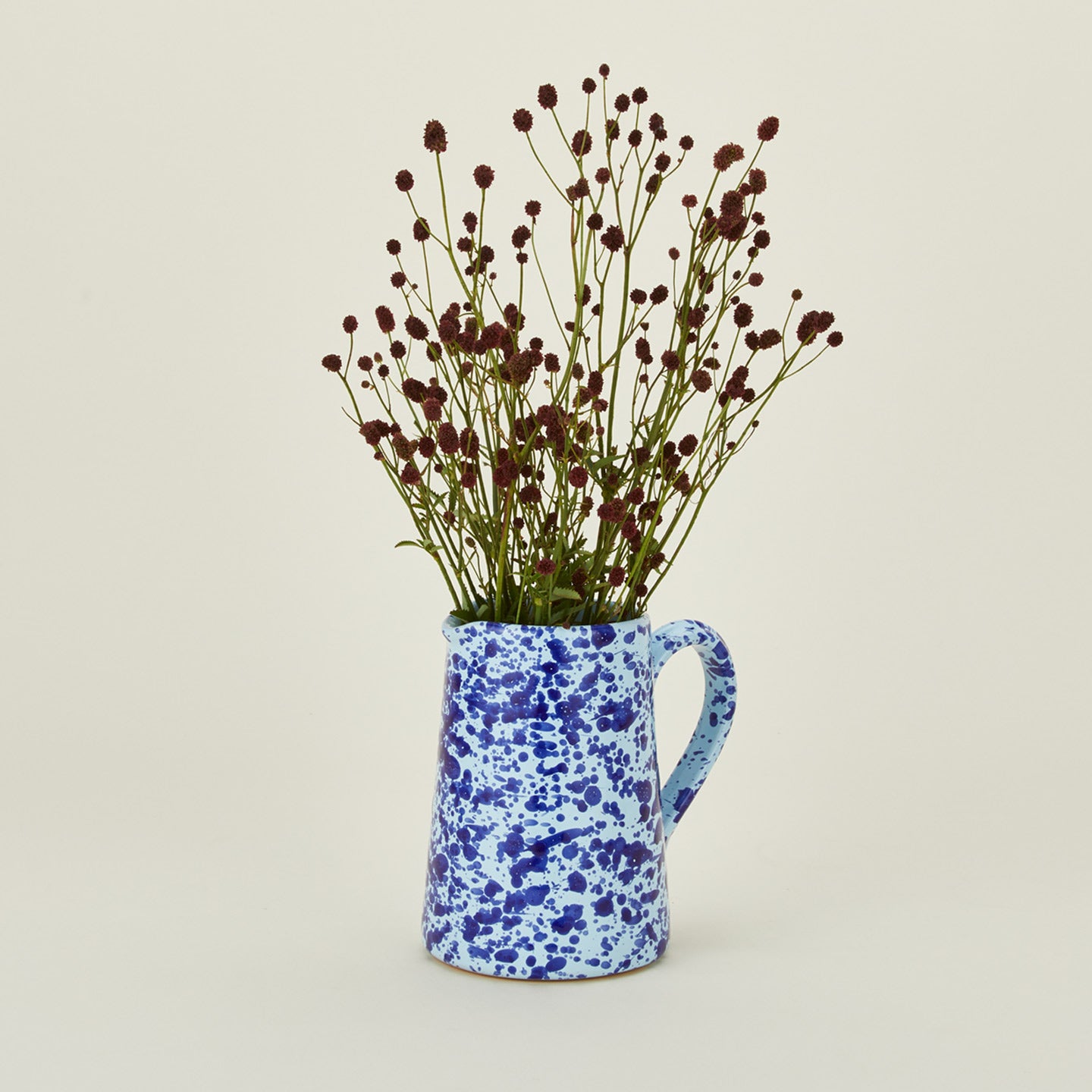 Small splatterware pitcher in sky and cobalt with florals