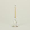 Small candlestick holder in white and bronze with candle