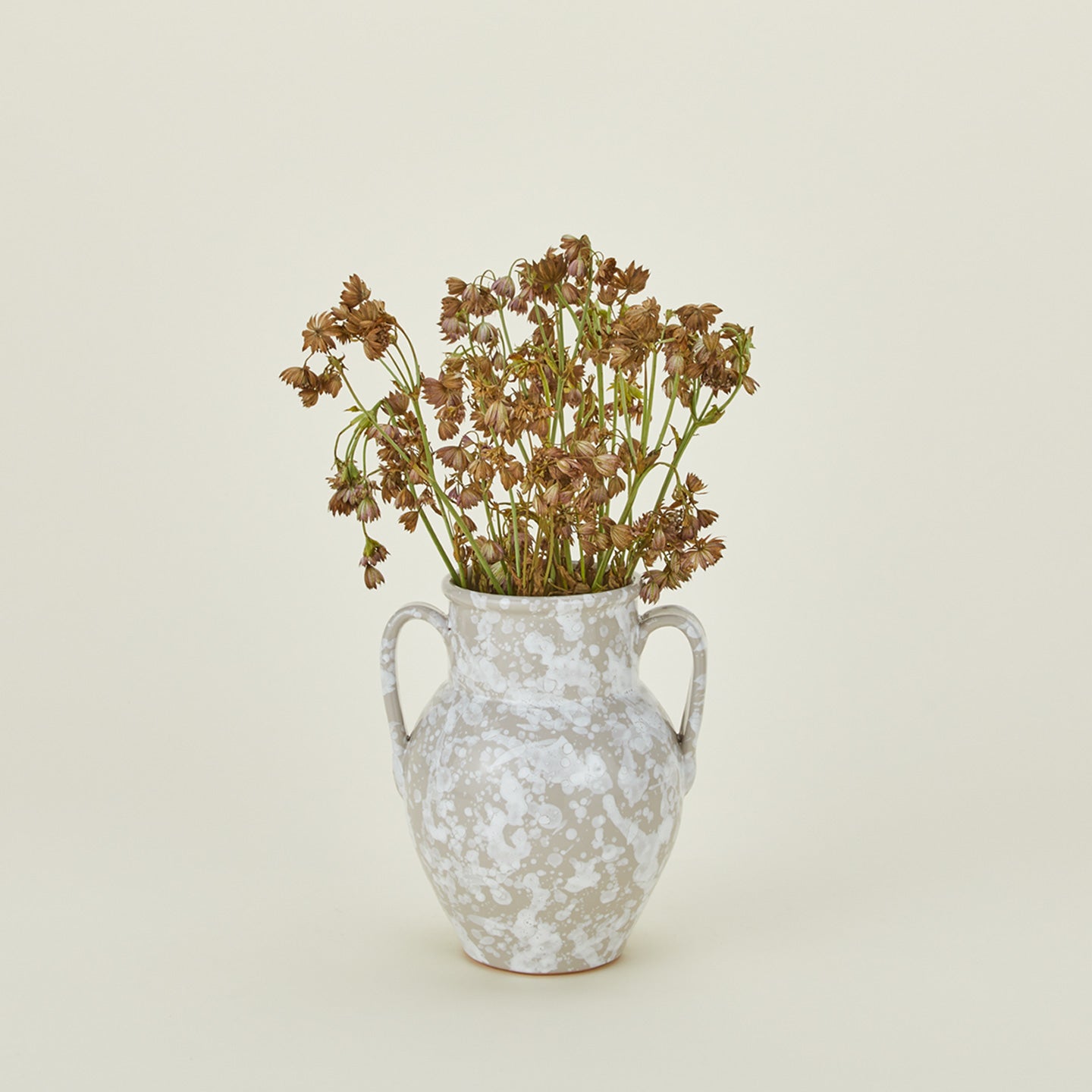Small splatterware vase in grey and white with florals