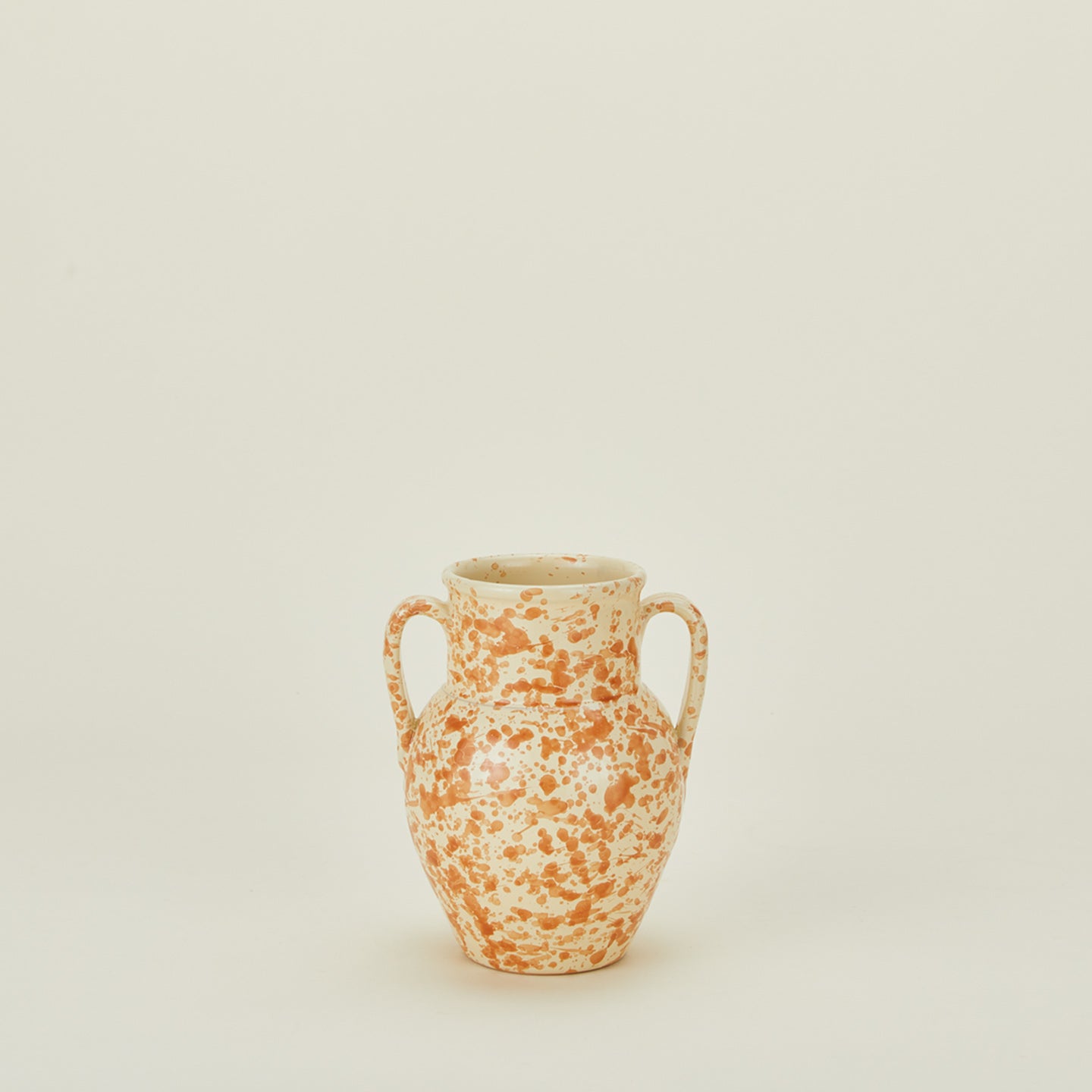 Small splatterware vase in ivory and bronze