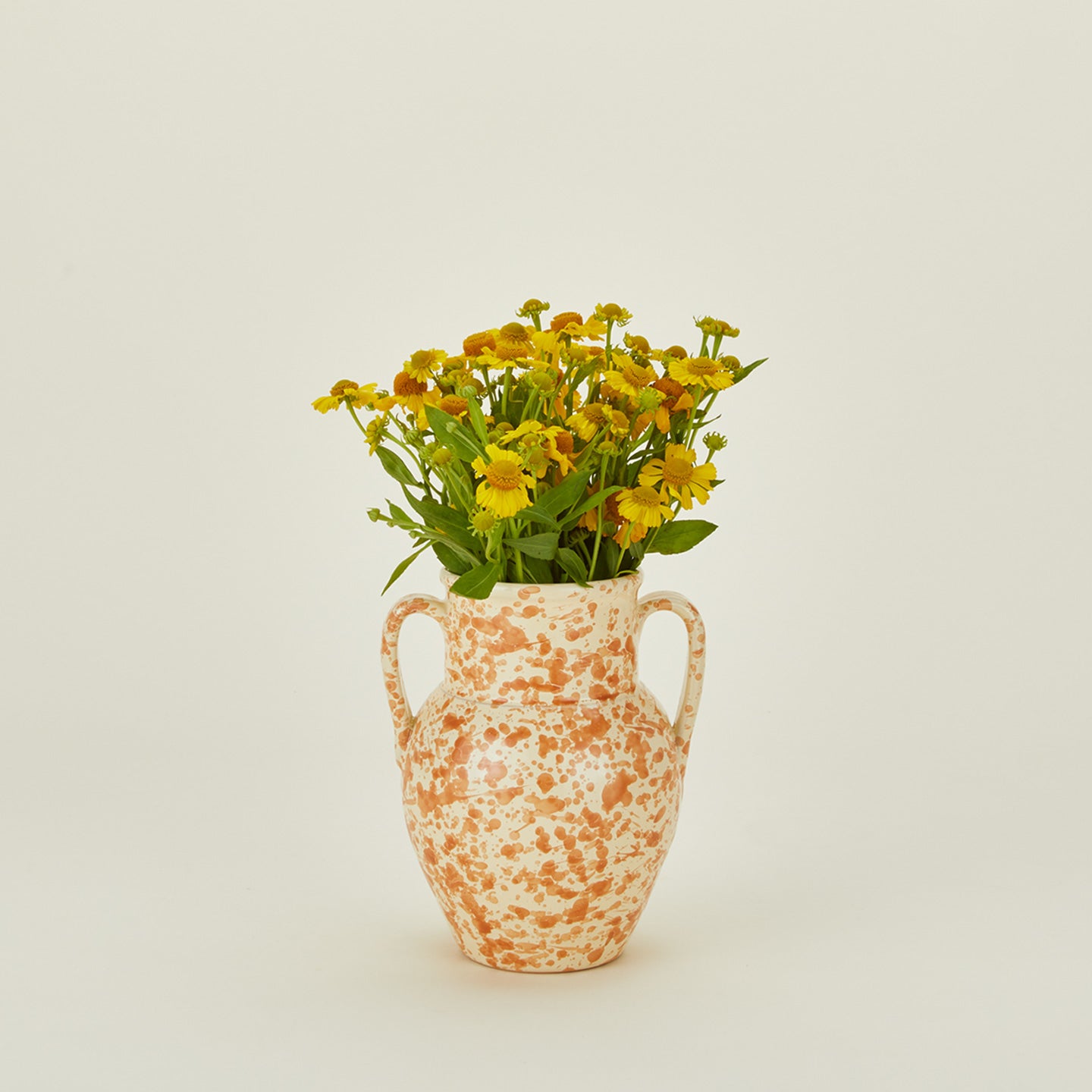 Small splatterware vase in ivory and bronze with florals