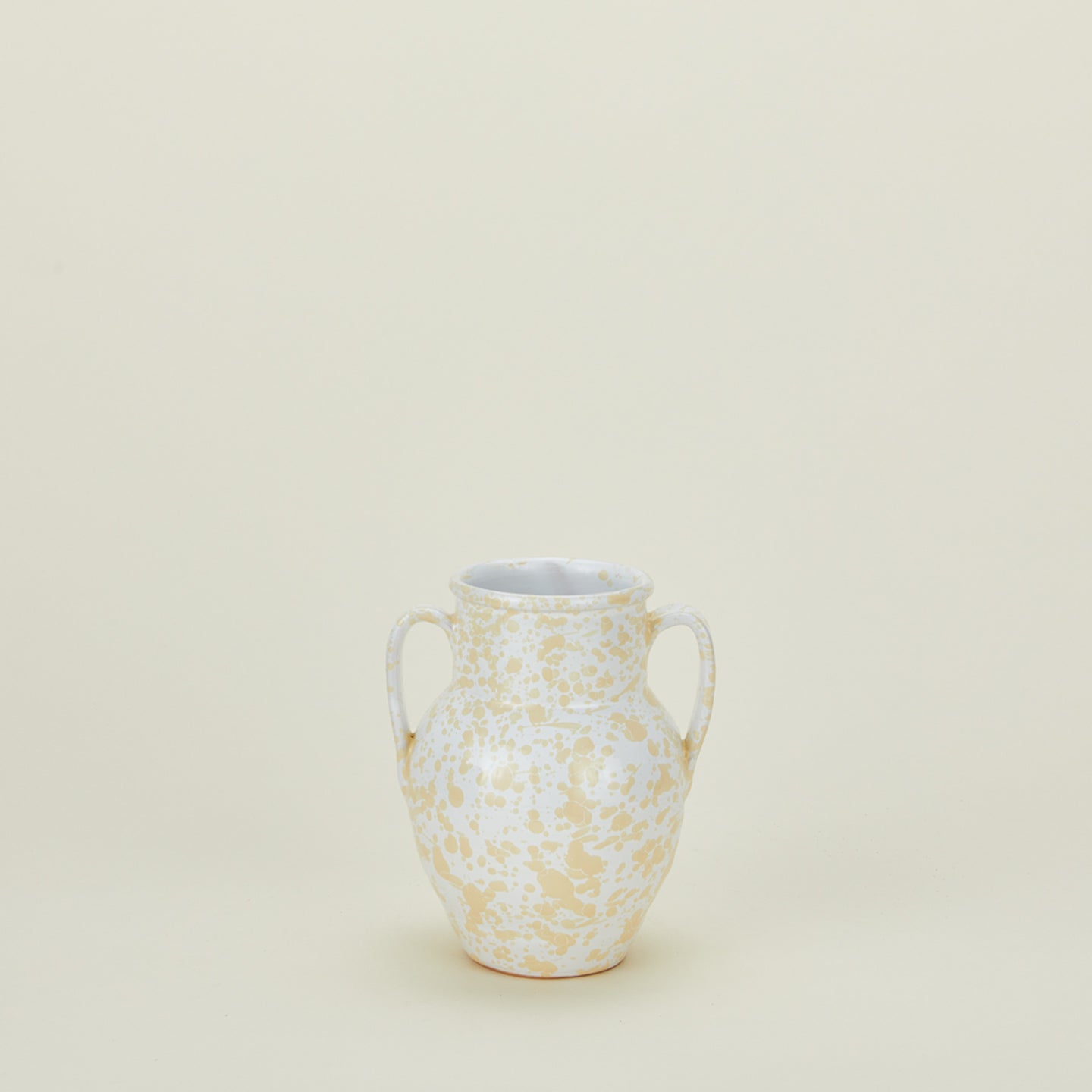 Small splatterware vase in ivory and white