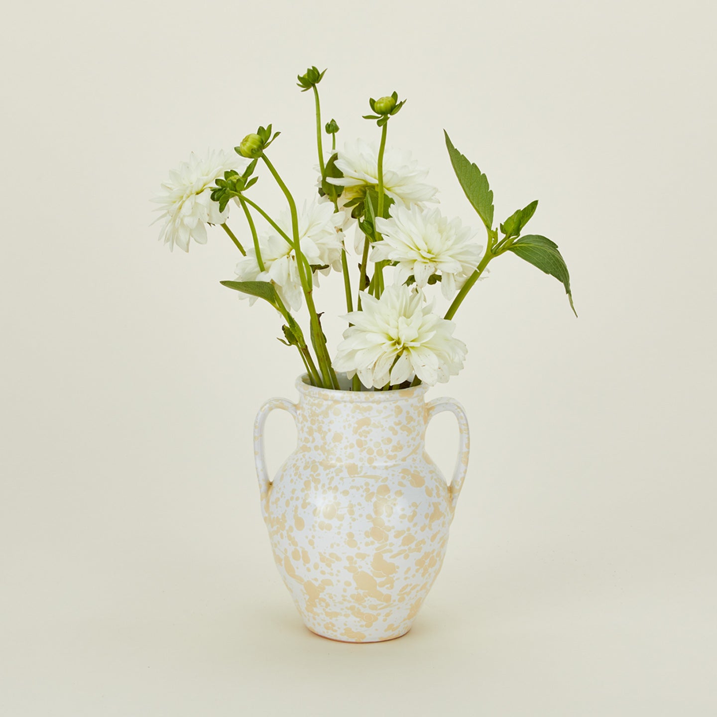 Small splatterware vase in ivory and white with florals