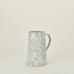 Large splatterware pitcher in white and grey