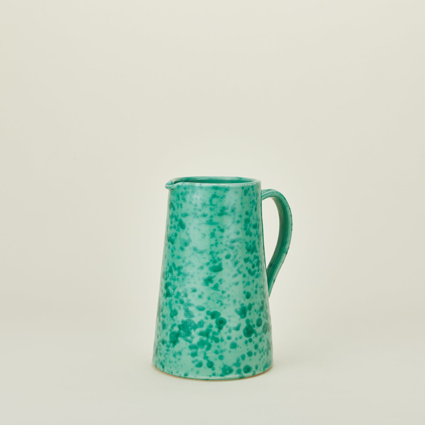 Large splatterware pitcher in sage and green