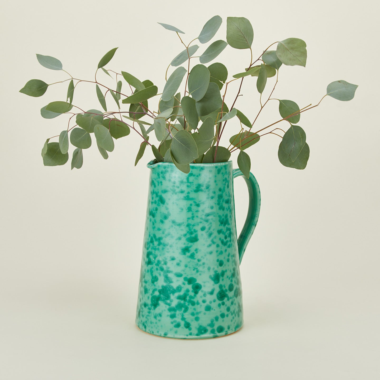 Large splatterware pitcher in sage and green with florals