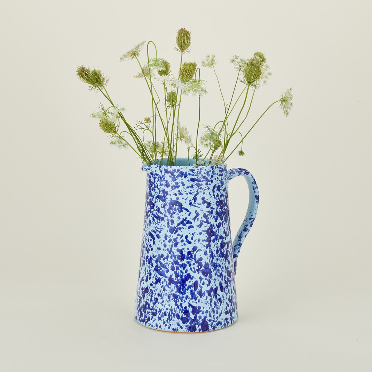 Large splatterware pitcher in sky and cobalt with florals