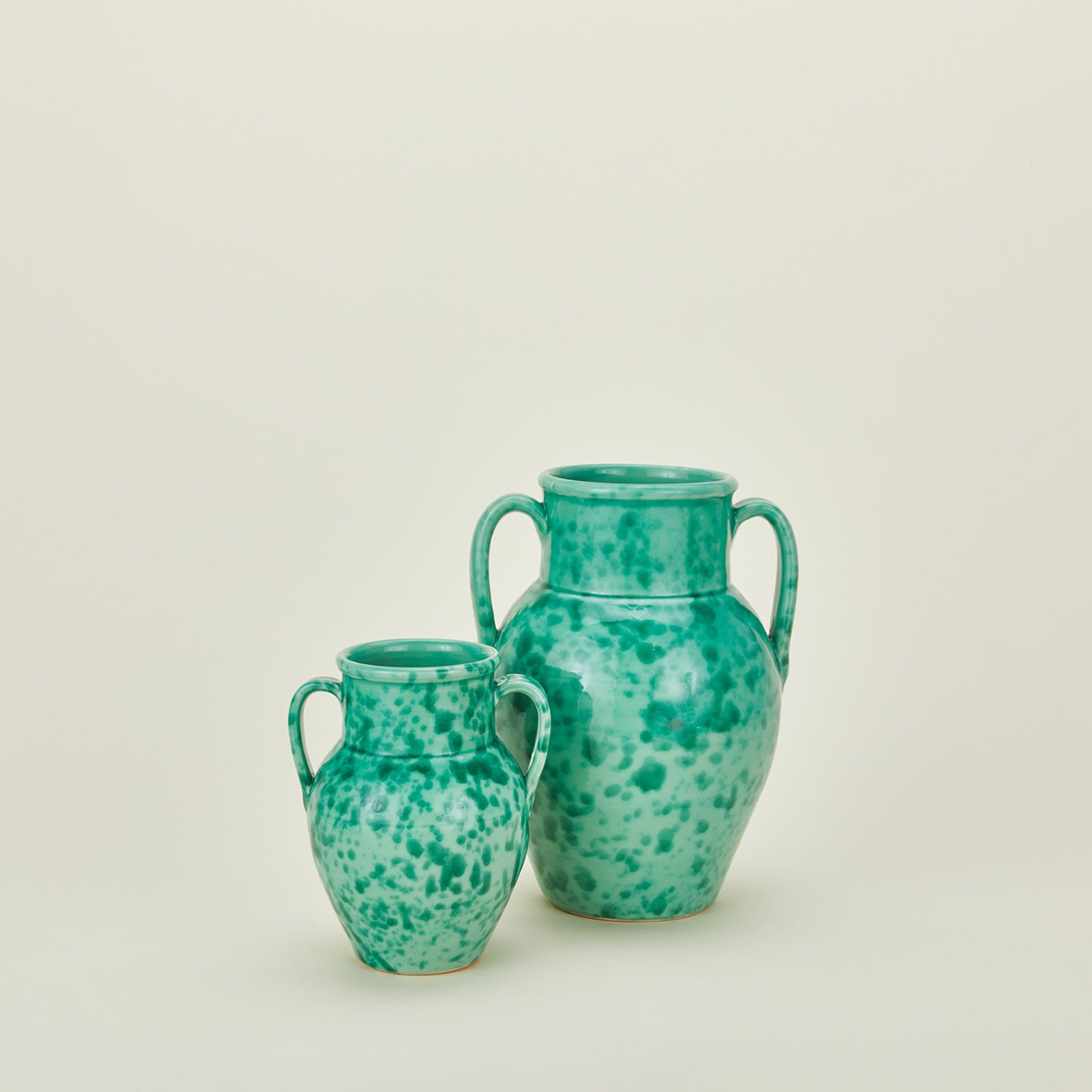 Small and large splatterware vase in sage and green
