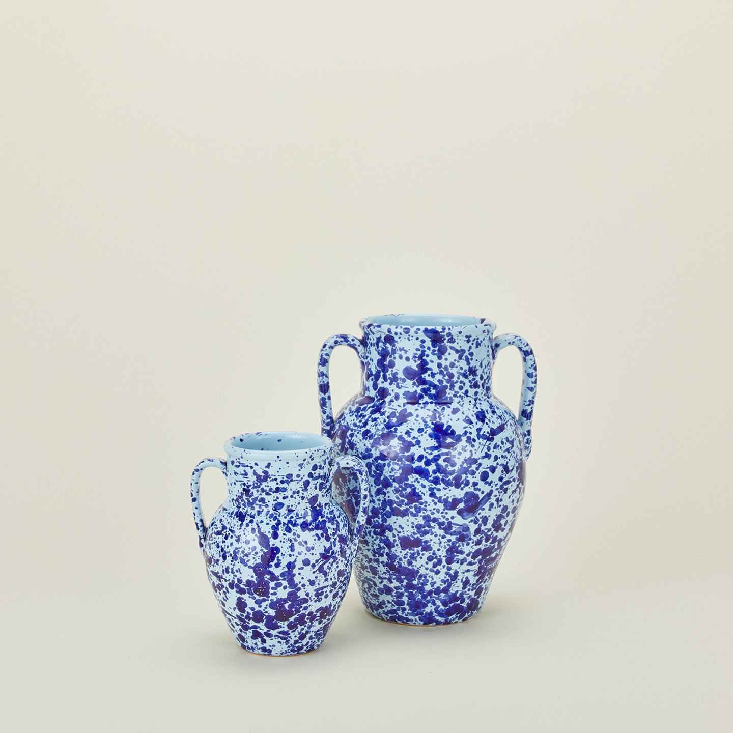 Large and small splatter ware vases in sky and cobalt