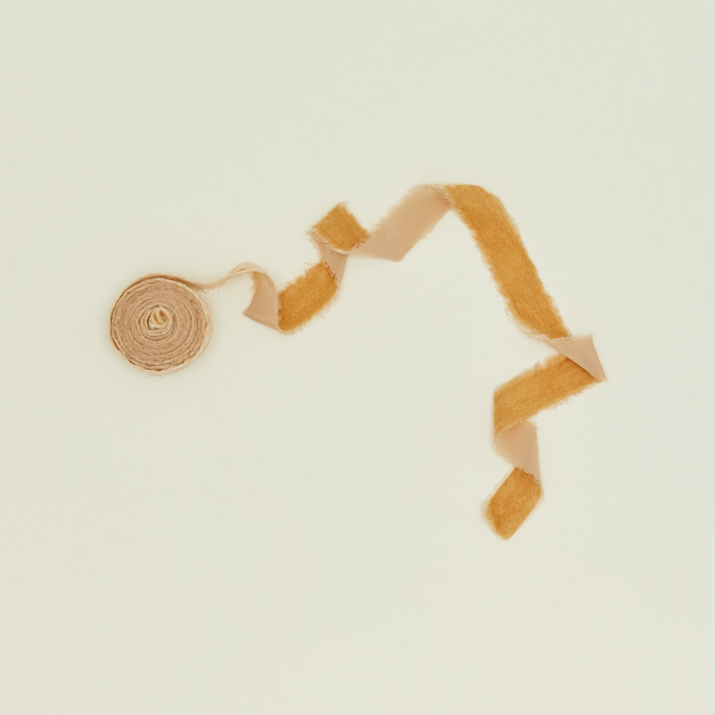 Raw edge velvet ribbon in gold