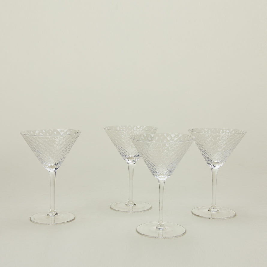 Four Veneziano martini glasses.