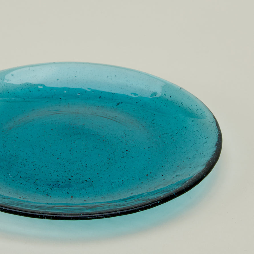 Close up of Glass Salad Plate in Peacock.