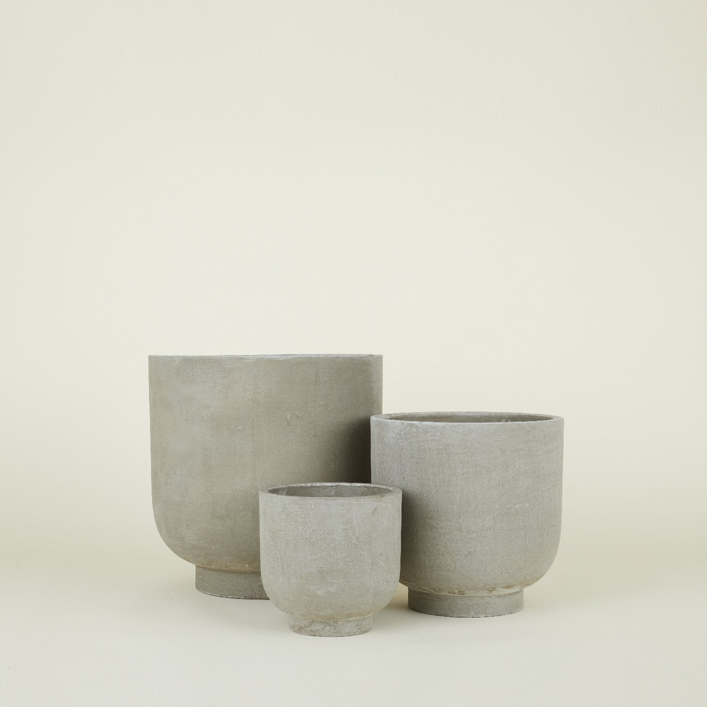 cement look planter pot Footed Planter
