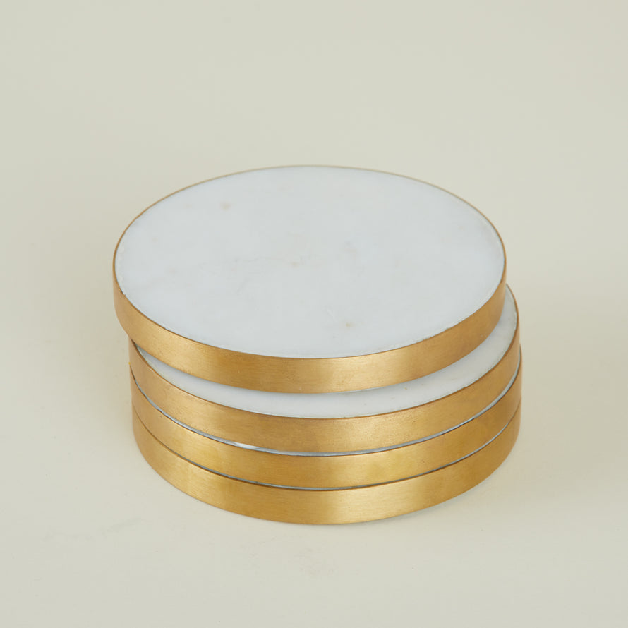 Close up of a stack of four Simple Marble Coasters.