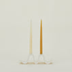 Stoneware Wyn Candelabra with taper candles.